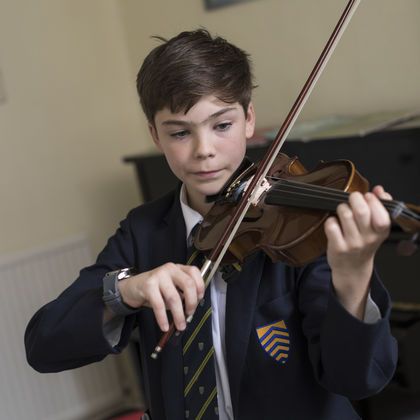 School pupil with violin