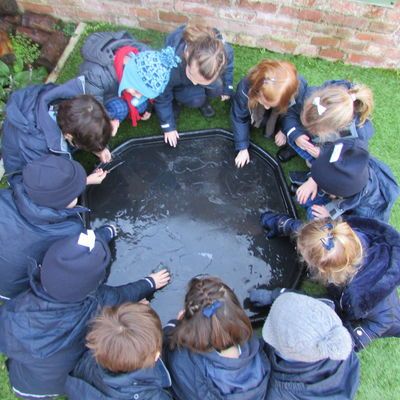 Nursery children break the ice in the garden